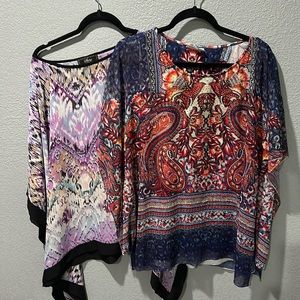 Bundle of two womens cape style blouses.